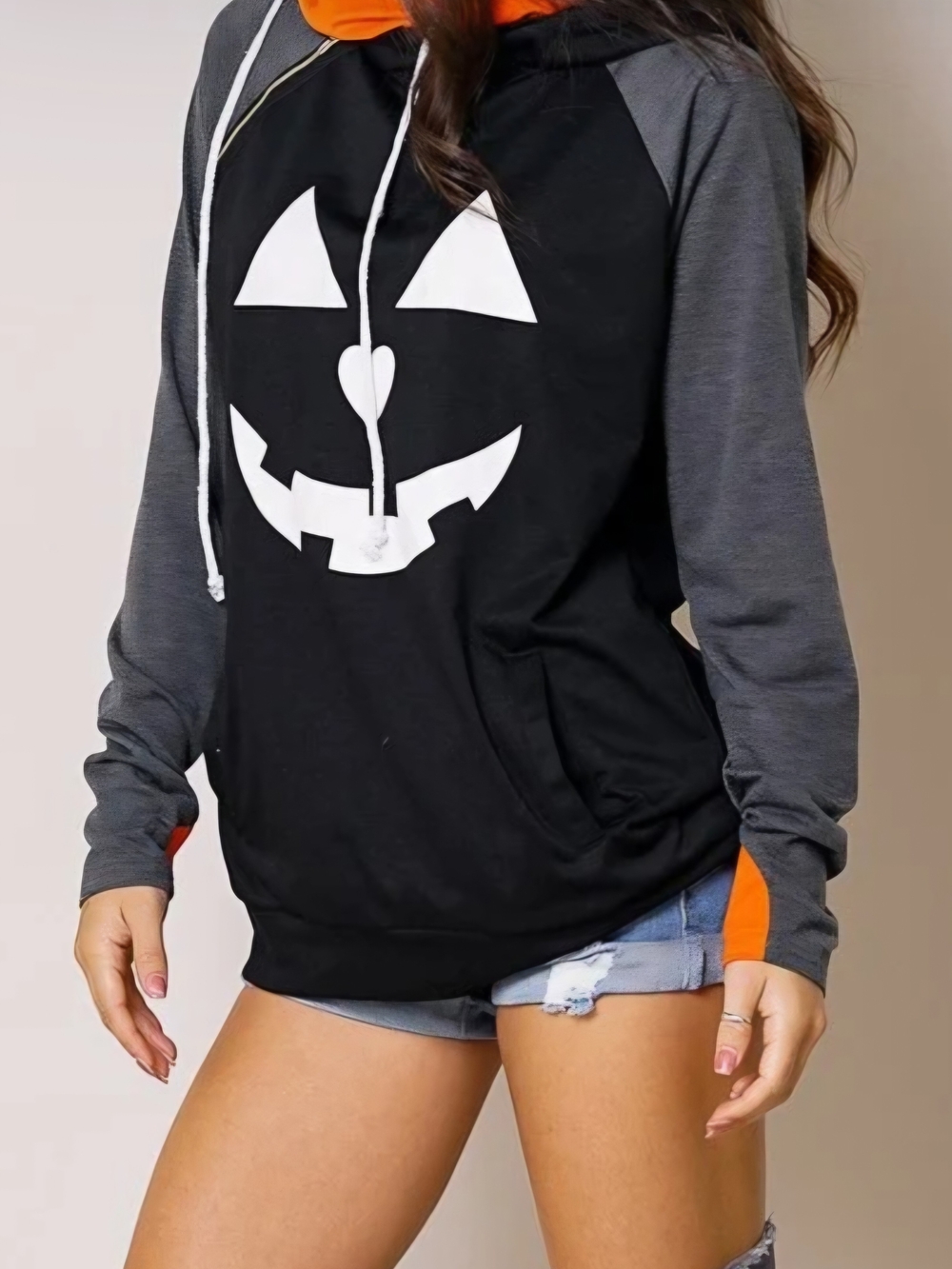 Jack-O-Lantern Face Graphic Hoodie featuring a Black Body /White Pumpkin Face